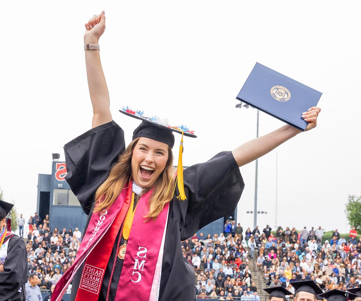 Saint Mary's student raising diploma to celebrate at commencement 2023